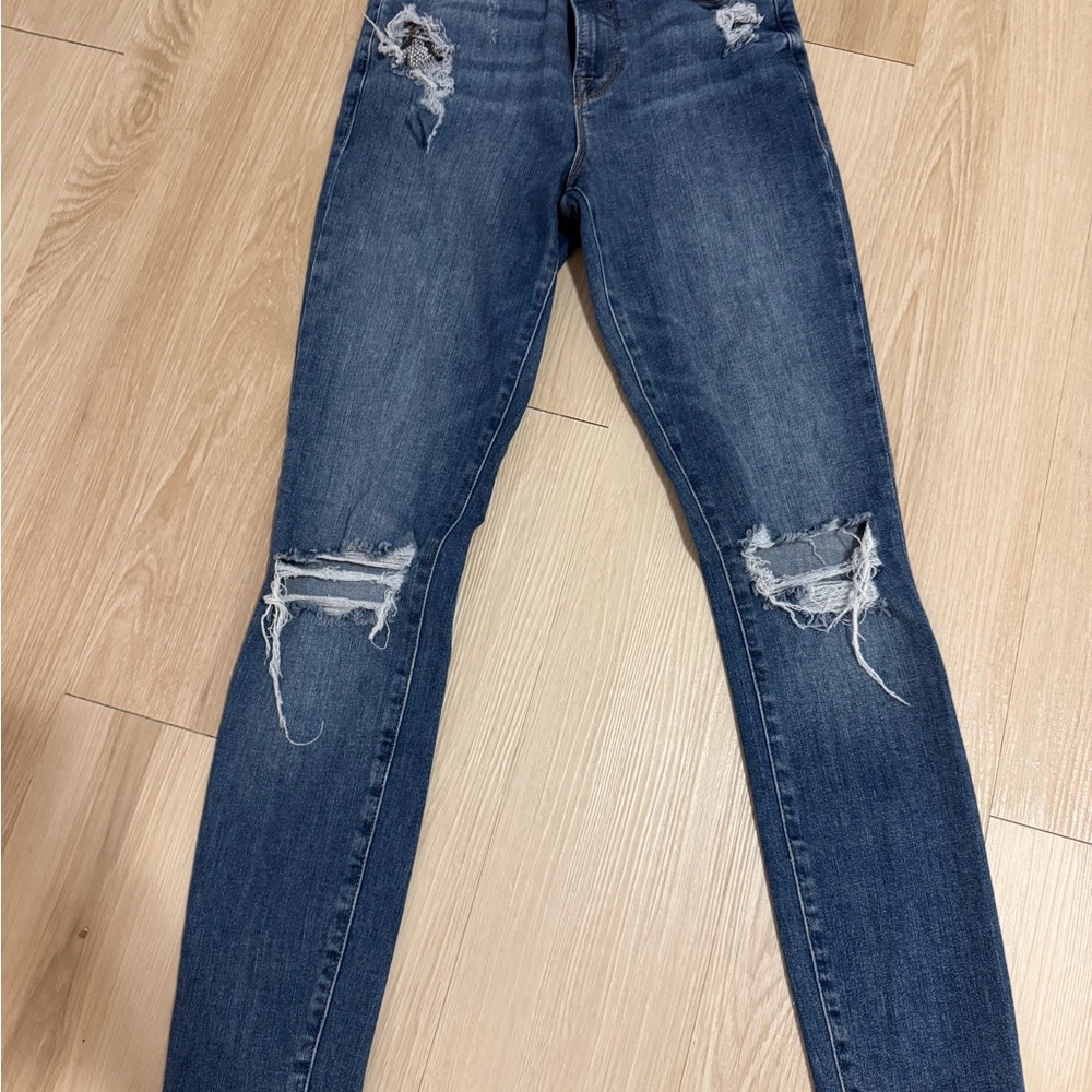 Good American Blue High Rise Jeans with Distressed Knees